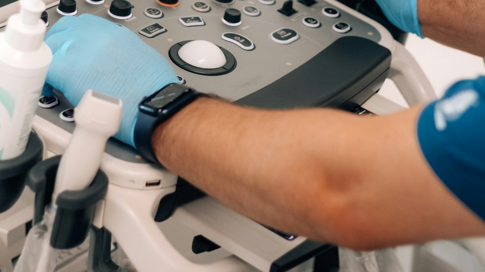 Clinician’s hand holding a tablet with the patient chart